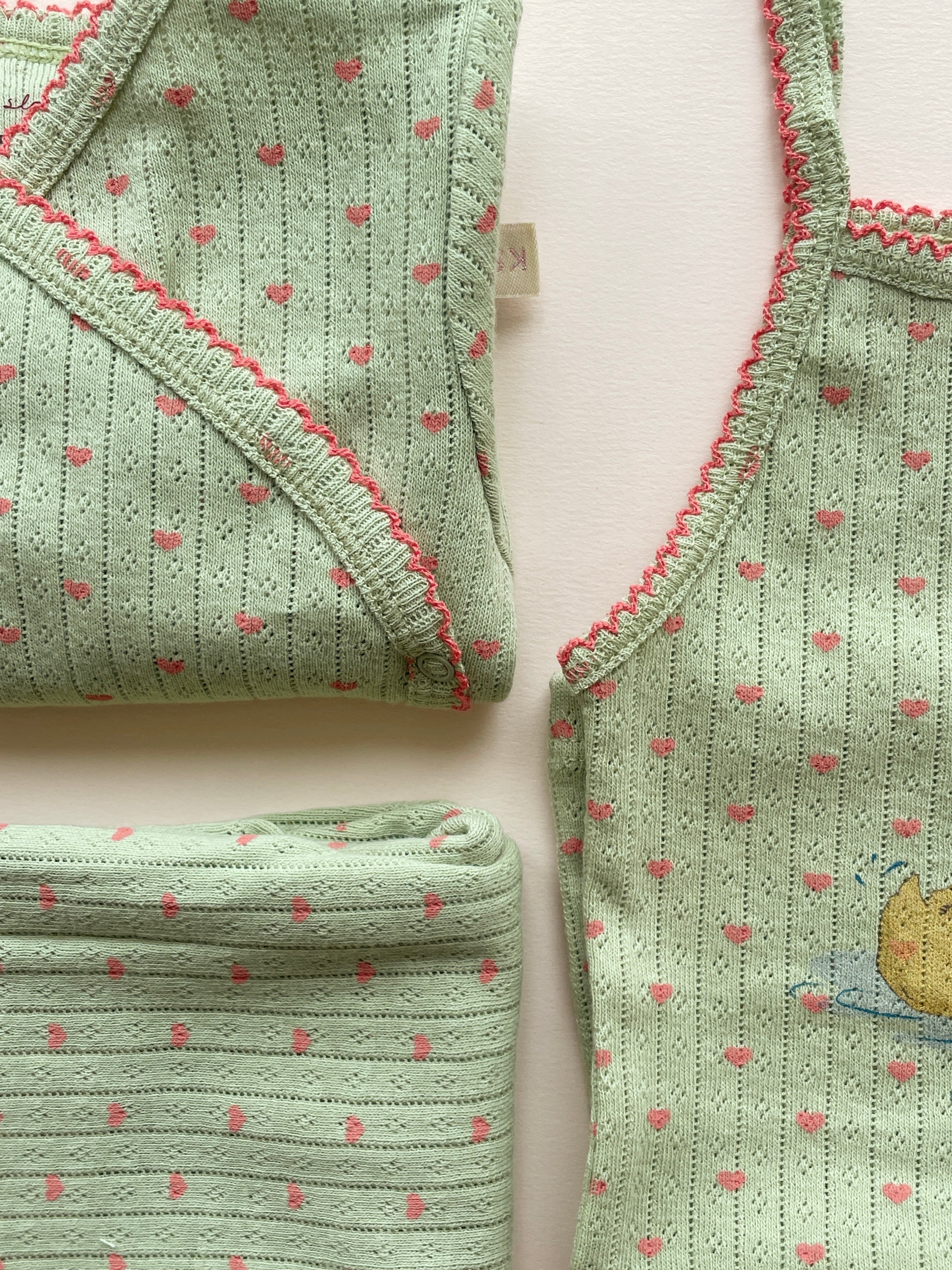 Minnie Newborn Onesie in Coeur Lint